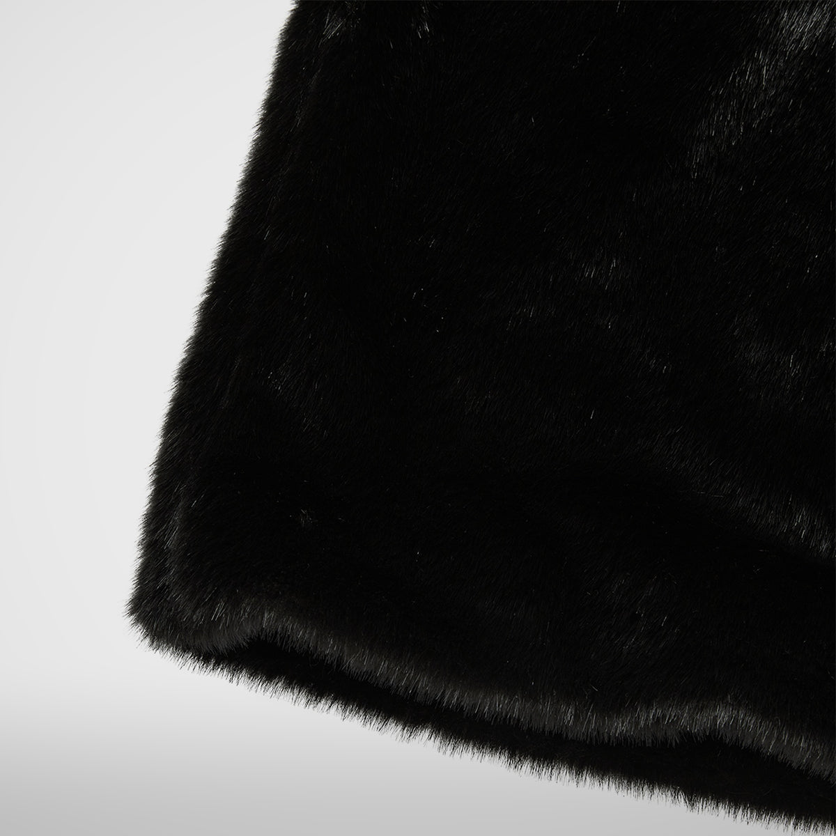 THREE RIDING SKULL FUR COAT