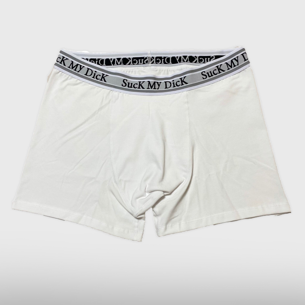 White Suck My Dick boxer briefs laid flat, front view with a white and grey waistband